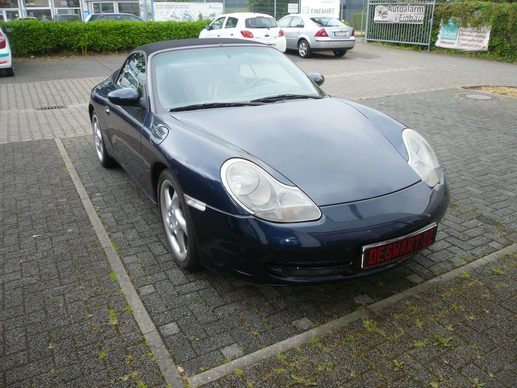 Verdeckbezug in Sonnenland Stoff schwarz, geliefert und montiert.