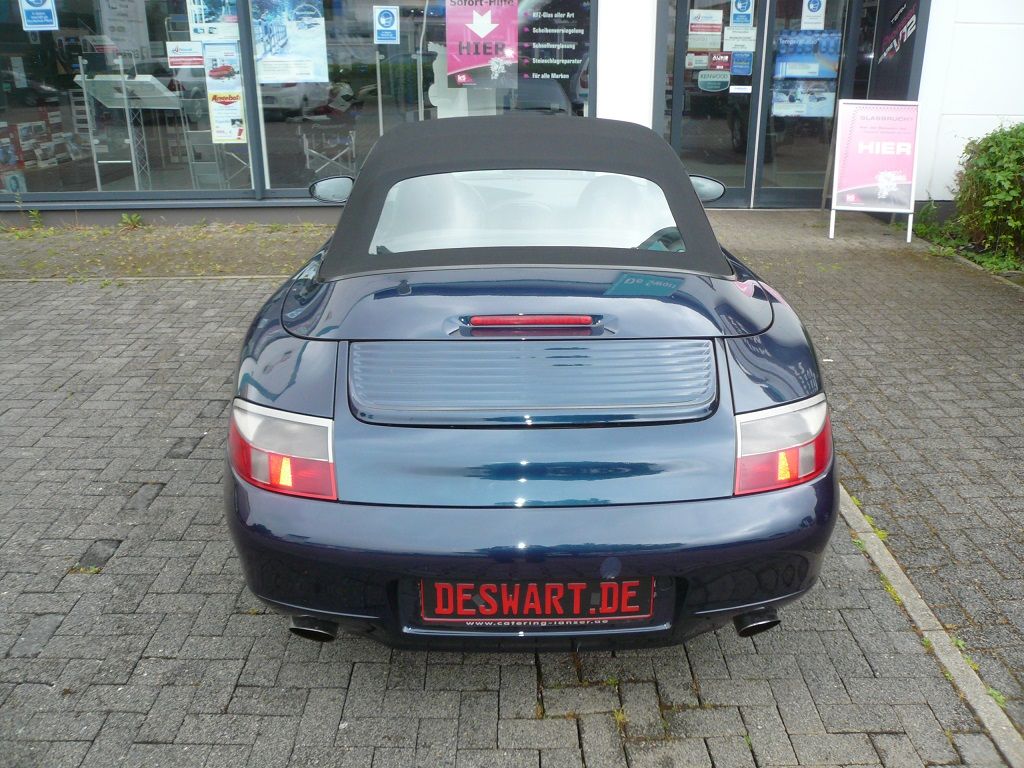 Verdeckbezug in Sonnenland Stoff schwarz, geliefert und montiert.