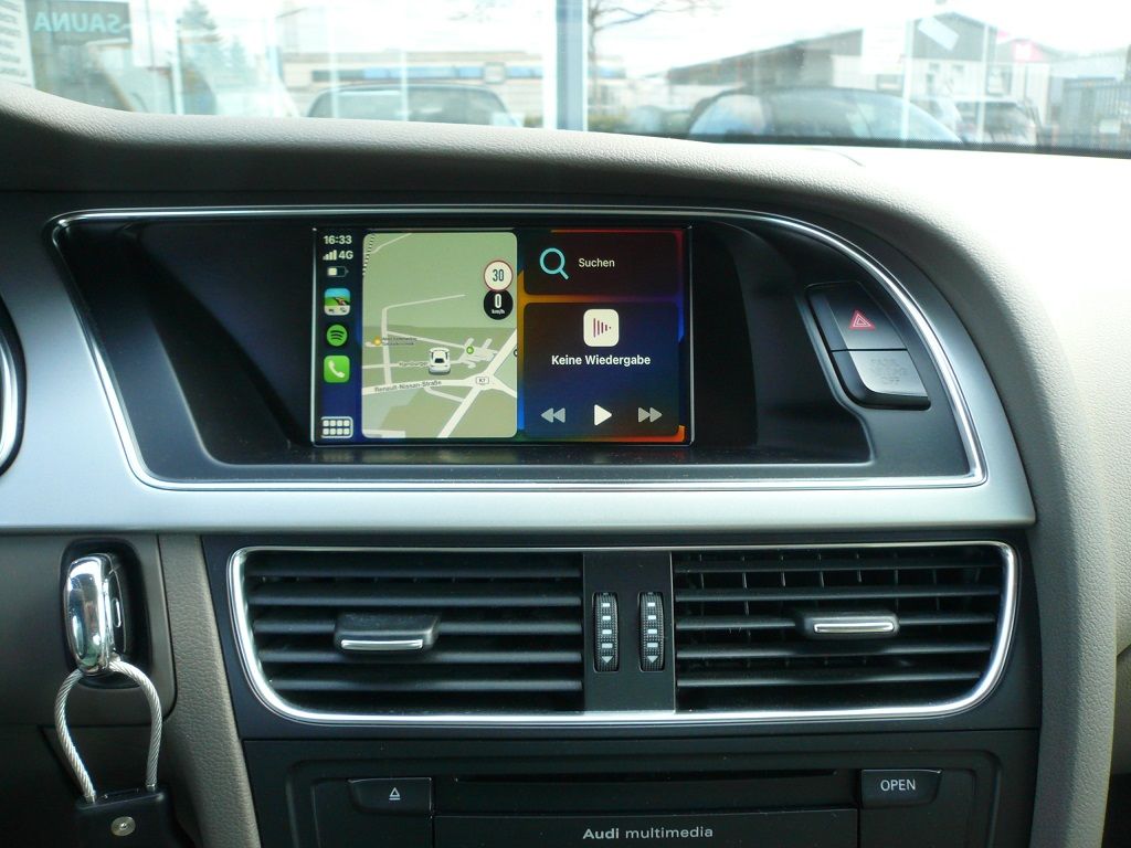 Smartphone Integration von Apple CarPlay und Android Auto wireless in ihr werkseitig verbautes MMI 3G High Navigations System von Audi.
