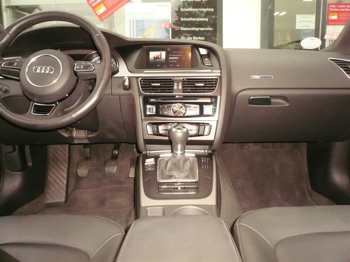 Alpine X702D-A5 7-Zoll Premium-Infotainment-System für Audi A5 mit Navigationssystem, Apple CarPlay und Android Auto Unterstützung nachgerüstet.