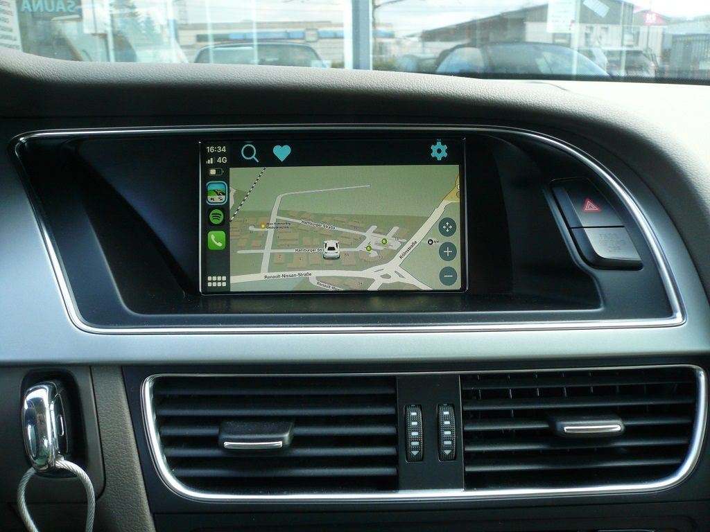 Smartphone Integration von Apple CarPlay und Android Auto wireless in ihr werkseitig verbautes MMI 3G High Navigations System von Audi.