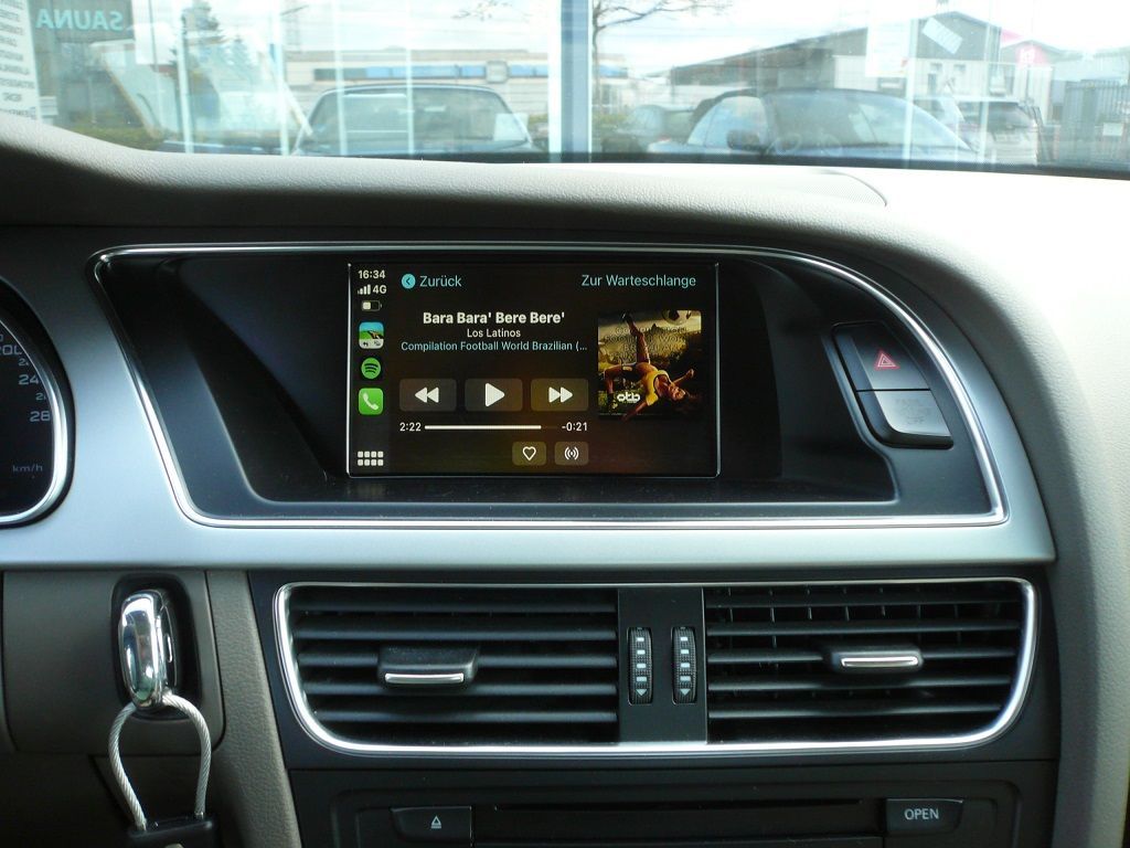 Smartphone Integration von Apple CarPlay und Android Auto wireless in ihr werkseitig verbautes MMI 3G High Navigations System von Audi.