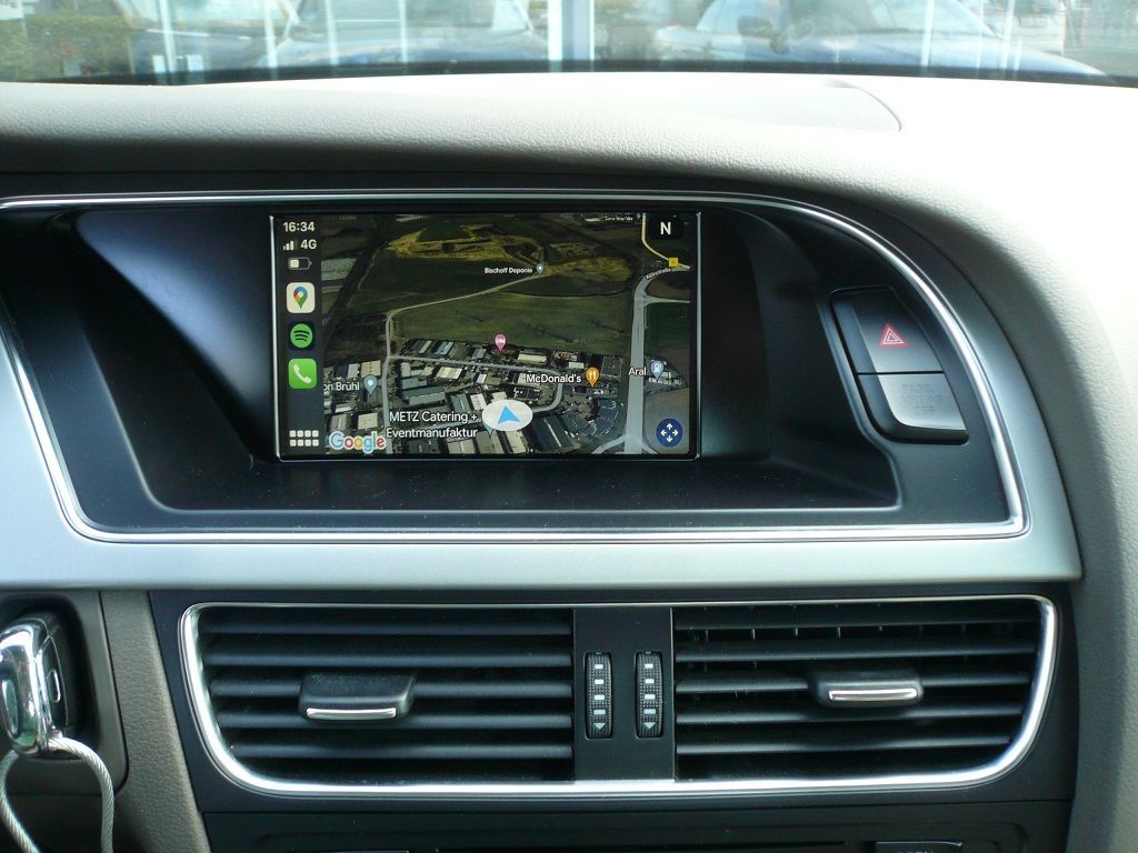 Smartphone Integration von Apple CarPlay und Android Auto wireless in ihr werkseitig verbautes MMI 3G High Navigations System von Audi.