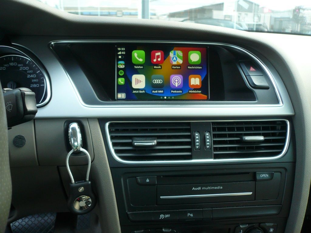 Smartphone Integration von Apple CarPlay und Android Auto wireless in ihr werkseitig verbautes MMI 3G High Navigations System von Audi.