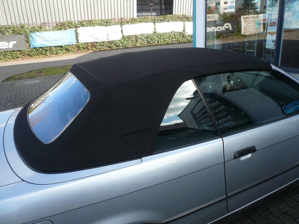 BMW E36 Cabrio, Verdeckbezug Sonnenland Stoff scharz mit Seitentaschen geliefert und montiert.