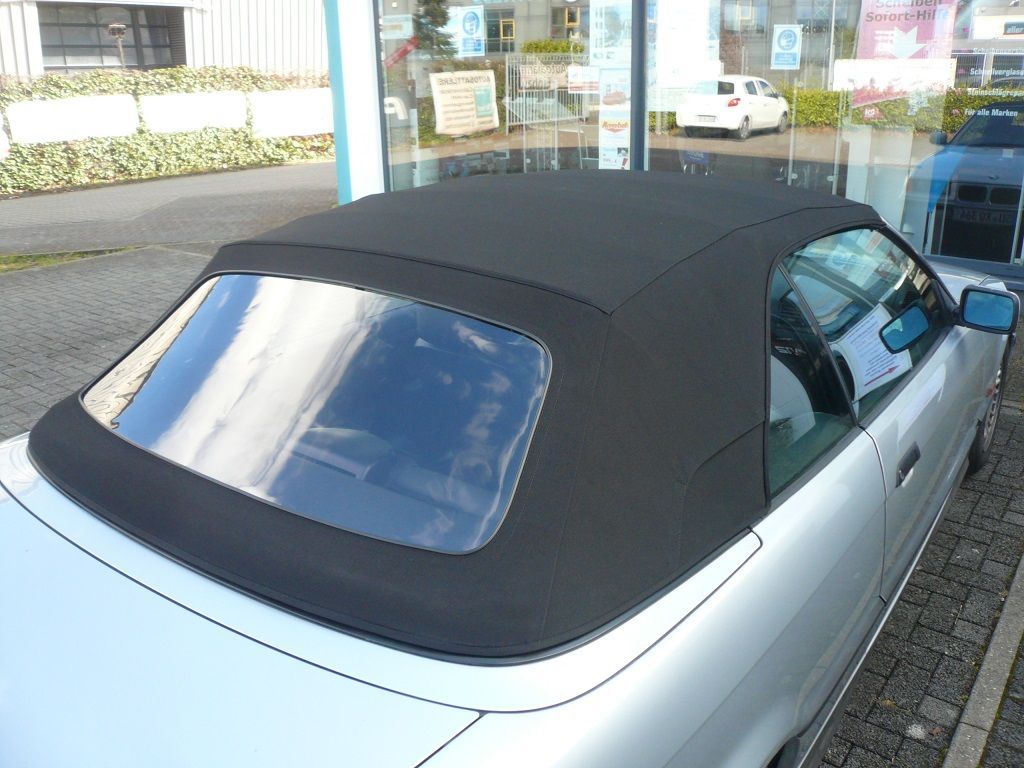 BMW E36 Cabrio, Verdeckbezug Sonnenland Stoff scharz mit Seitentaschen geliefert und montiert.