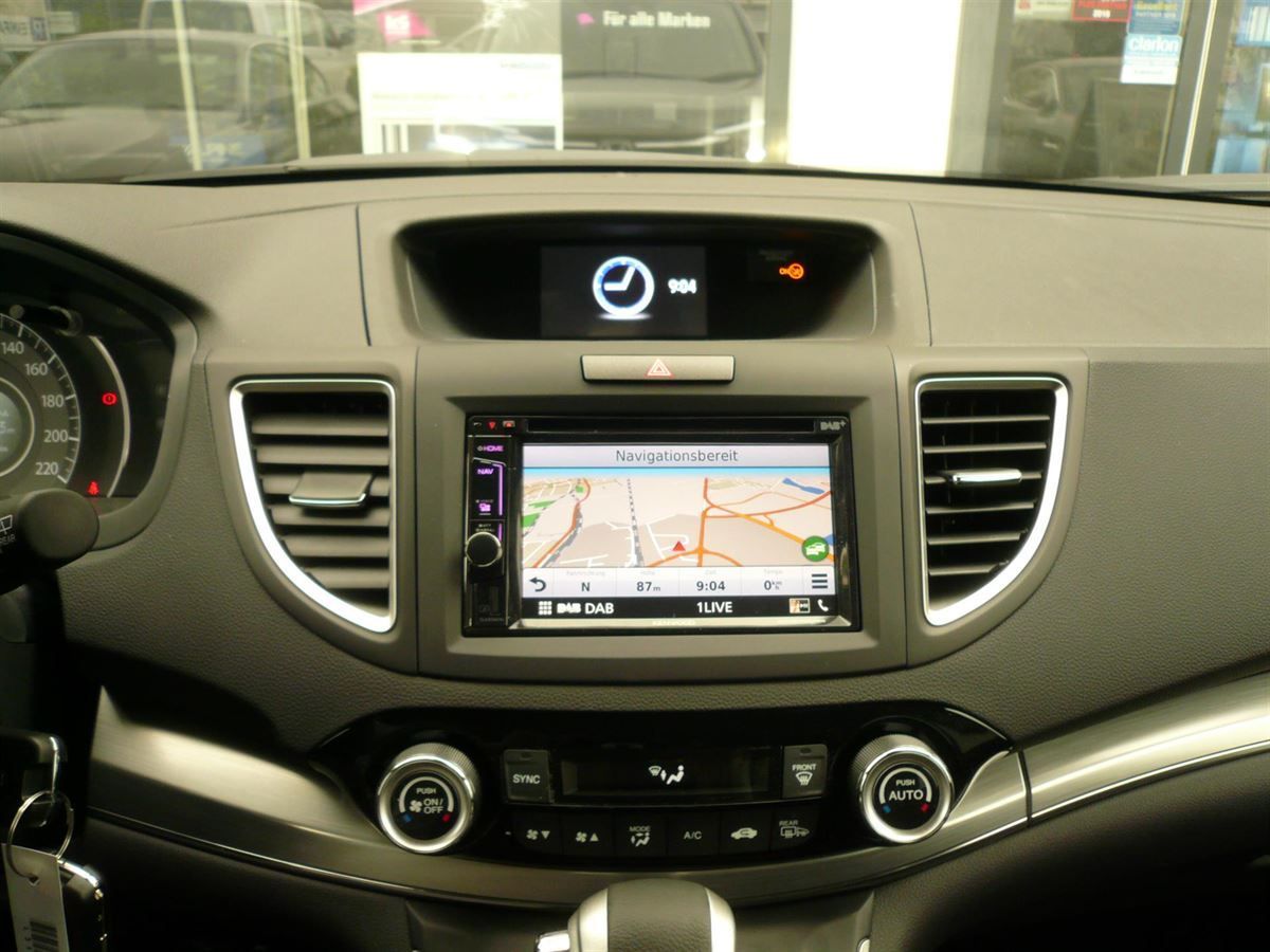 Clarion NX505E im Honda CRV nachgrüstet. Werkseitige Lenkrad-Fernbedienung auf das Clarion adaptiert.