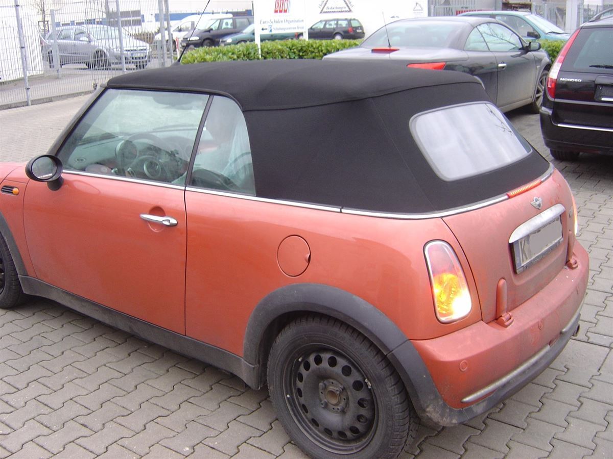 Mini, Verdeckbezug in Sonnenland Stoff grün geliefert und montiert.