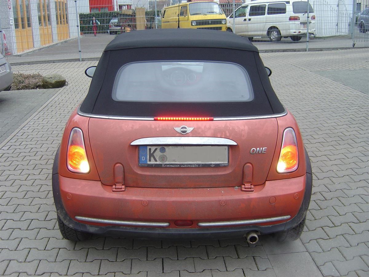 Mini, Verdeckbezug in Sonnenland Stoff grün geliefert und montiert.