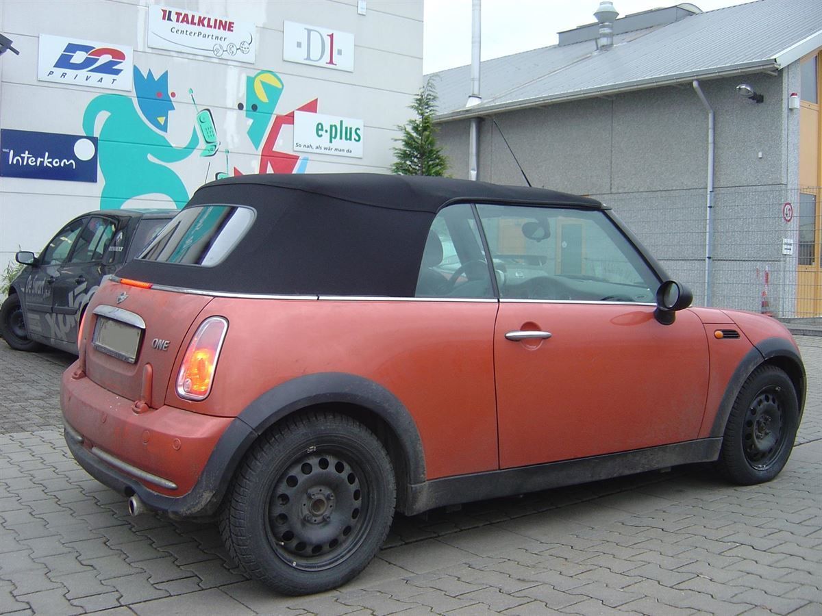Mini, Verdeckbezug in Sonnenland Stoff grün geliefert und montiert.
