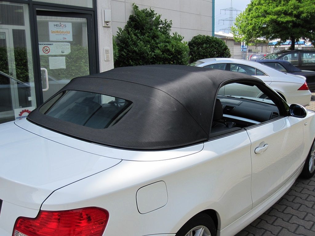 BMW 1er , Verdeckbezug Sonnenland Stoff schwarz geliefert und montiert.