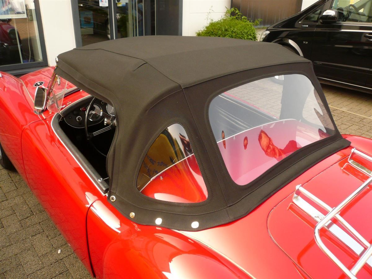 Verdeckbezug in Stoff neu geliefert & montiert.