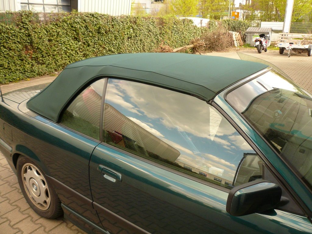 BMW 3er Typ E36 , Verdeckbezug Sonnenland Stoff grün geliefert und montiert.