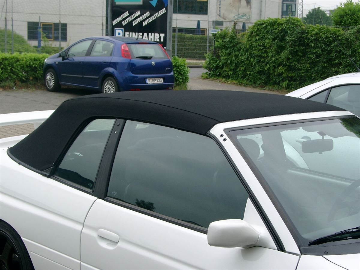 Fort Escort , Verdeckbezug Sonnenland Stoff schwarz geliefert und montiert.