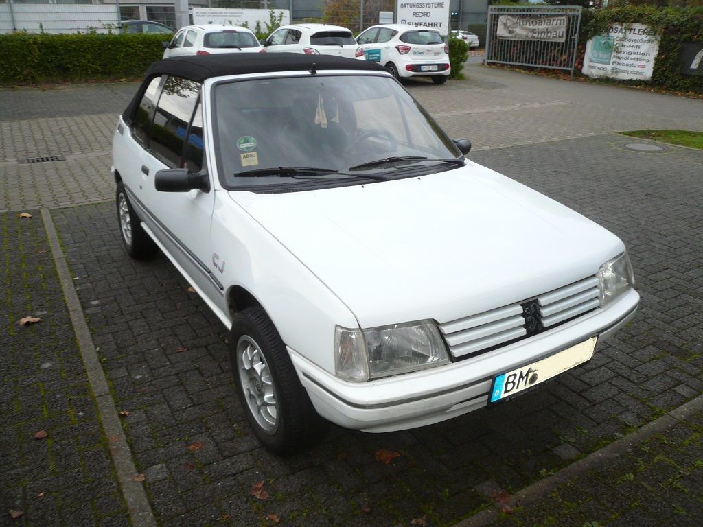 Verdeck Bezug in Sonnenland Stoff schwarz für Peugeot 205 geliefert und montiert