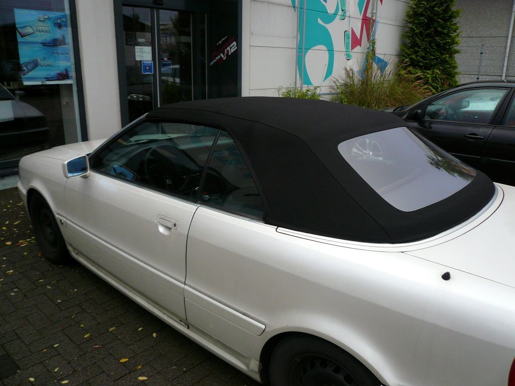 Audi 80, Verdeckbezug Sonnenland Stoff schwarz geliefert und montiert.