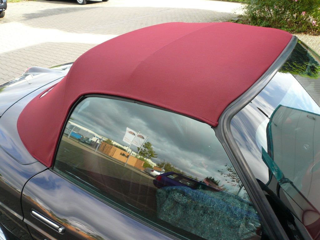 Fiat Barchetta , Verdeckbezug Sonnenland Stoff schwarz geliefert und montiert.