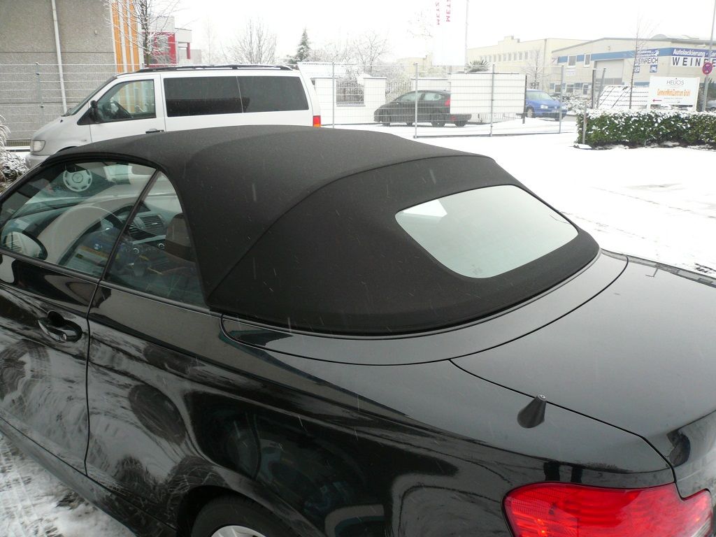BMW 1er , Verdeckbezug Sonnenland Stoff schwarz geliefert und montiert.