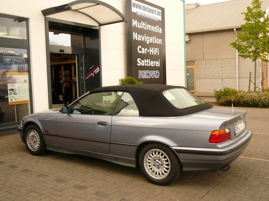 BMW 3er Typ E36 , Verdeckbezug Sonnenland Stoff grün geliefert und montiert.