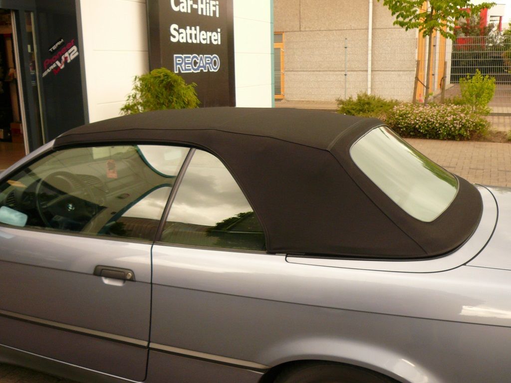 BMW 3er Typ E36 , Verdeckbezug Sonnenland Stoff grün geliefert und montiert.