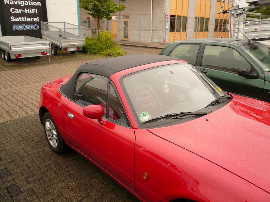 Mazda MX5, Verdeckbezug in Sonnenland Stoff schwarz mit Glas Heckscheibe geliefert und montiert.