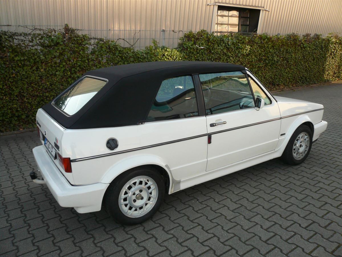 Golf 1 Cabrio, Verdeck Bezug in Sonnenland Stoff schwarz geliefert und montiert.