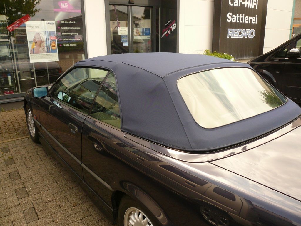 BMW 3er Typ E36 , Verdeckbezug Sonnenland Stoff grün geliefert und montiert.