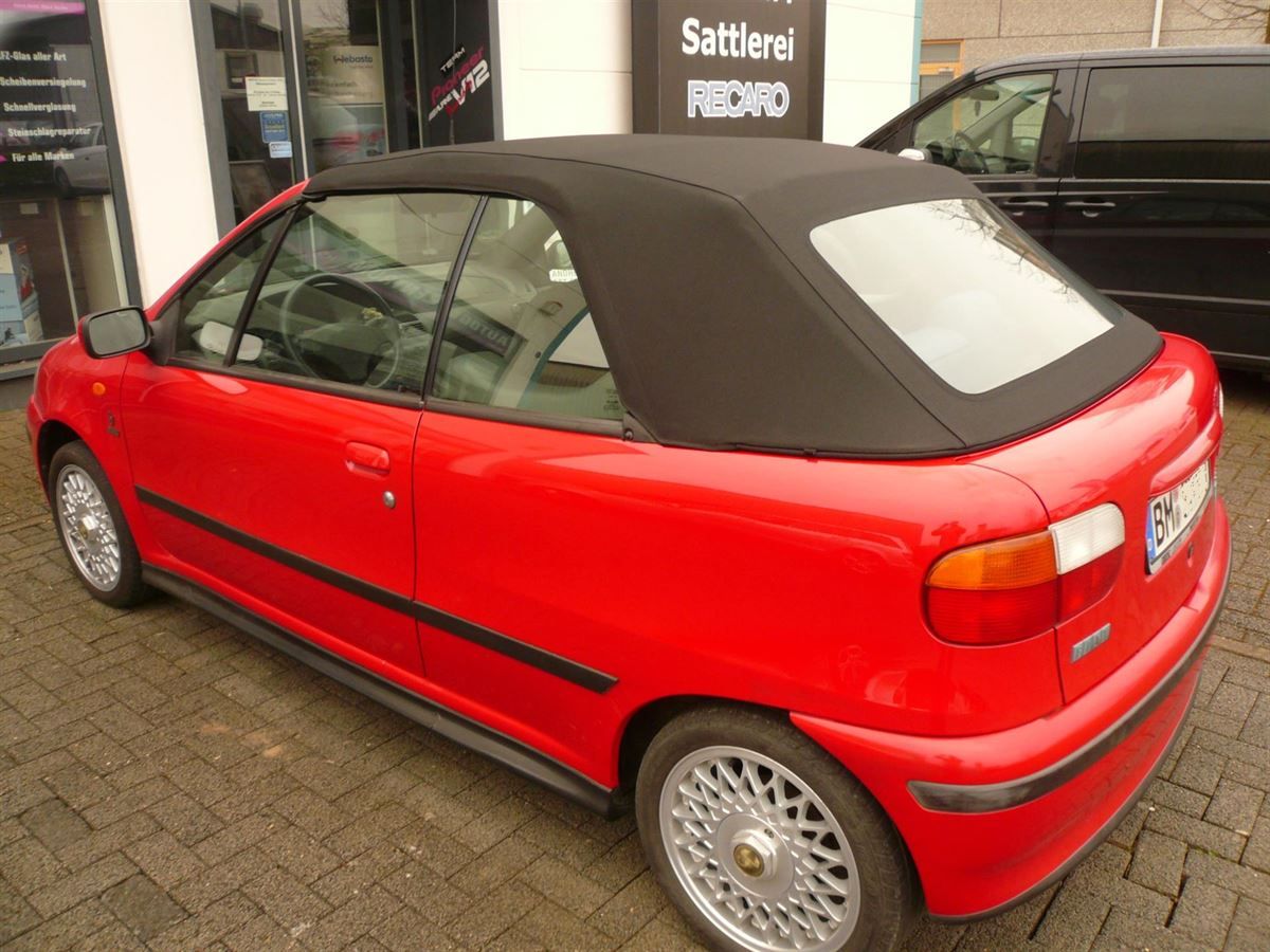 Fiat Punto , Verdeckbezug Sonnenland Stoff schwarz geliefert und montiert.
