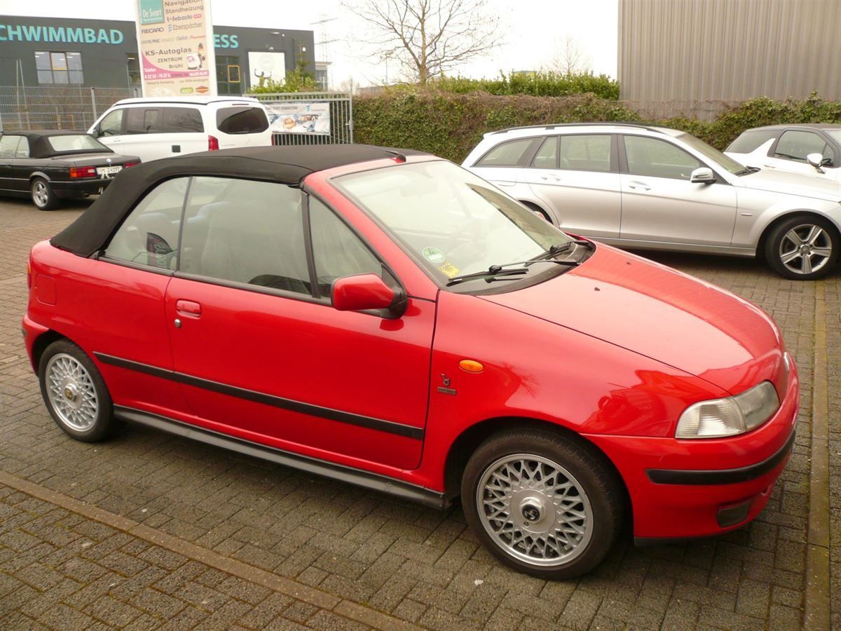 Fiat Punto , Verdeckbezug Sonnenland Stoff schwarz geliefert und montiert.
