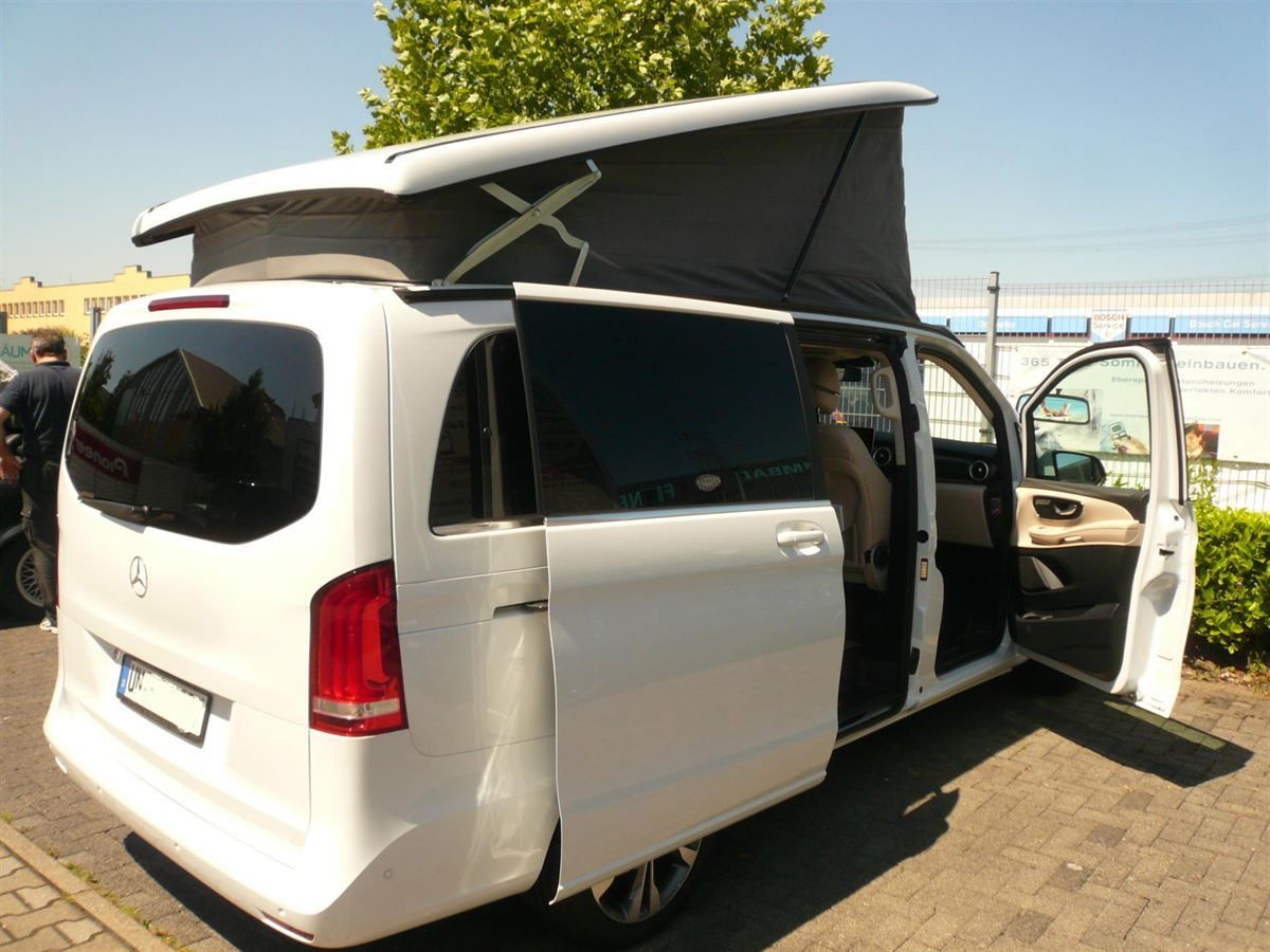 Kenwood Navigation und Rückfahrkamera nachgerüstet und an das werkseitige Command System angebunden.