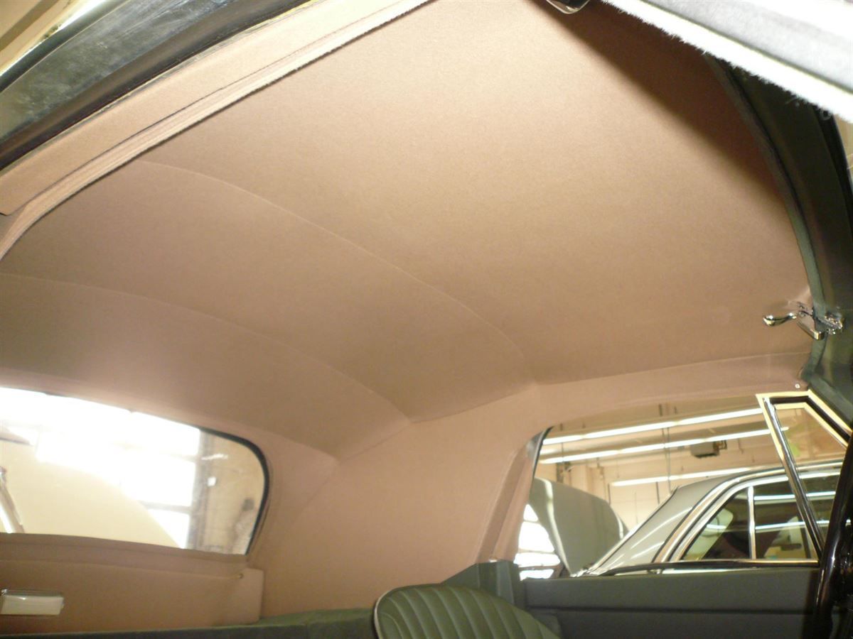 Verdeckbezug in Sonnenland Stoff grün und Innenhimmel neu angefertigt und montiert.