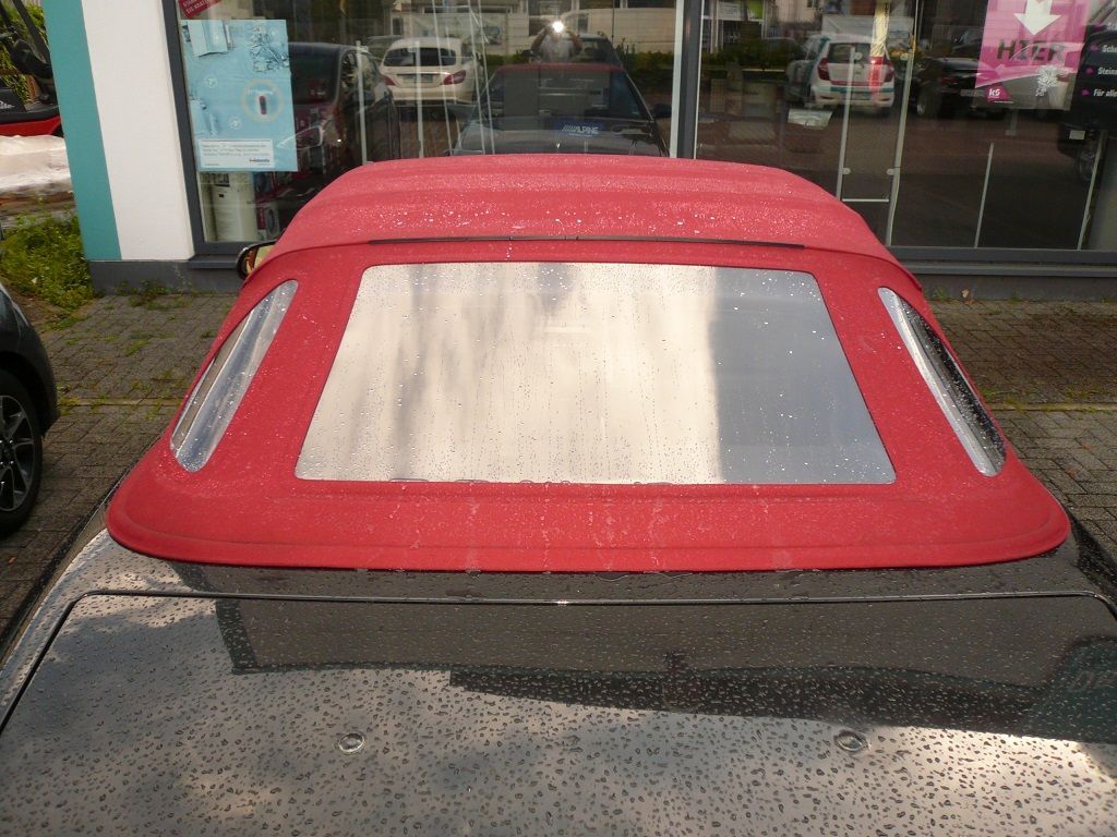 Mercedes SL 129er, Verdeckbezug in Sonnenland Stoff schwarz geliefert und montiert.
