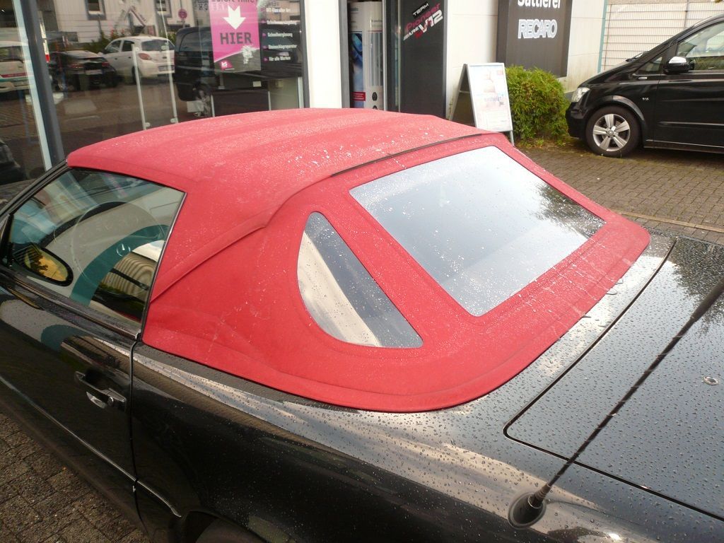 Mercedes SL 129er, Verdeckbezug in Sonnenland Stoff schwarz geliefert und montiert.