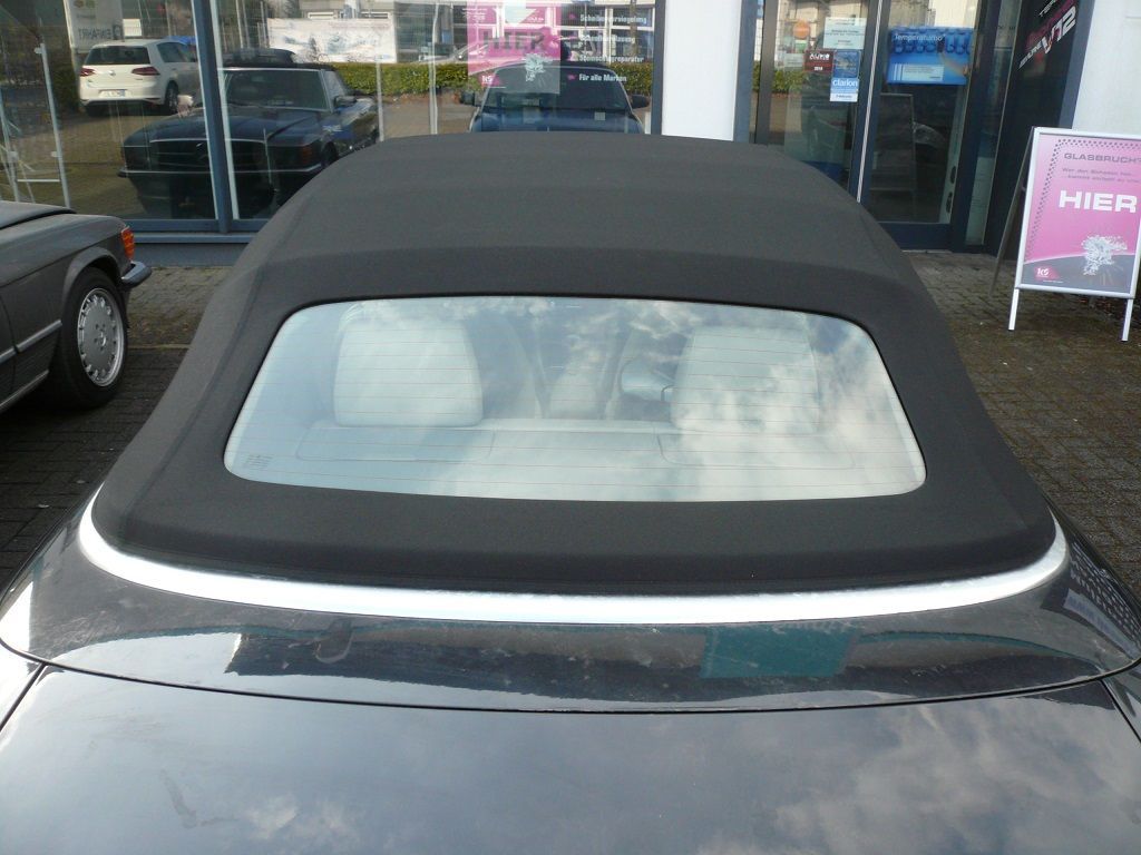 Audi A4, Verdeckbezug Sonnenland Stoff schwarz geliefert und montiert.