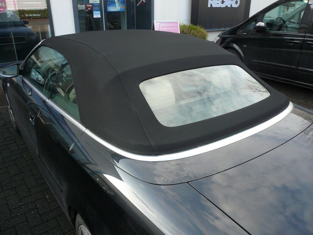 Audi A4, Verdeckbezug Sonnenland Stoff schwarz geliefert und montiert.