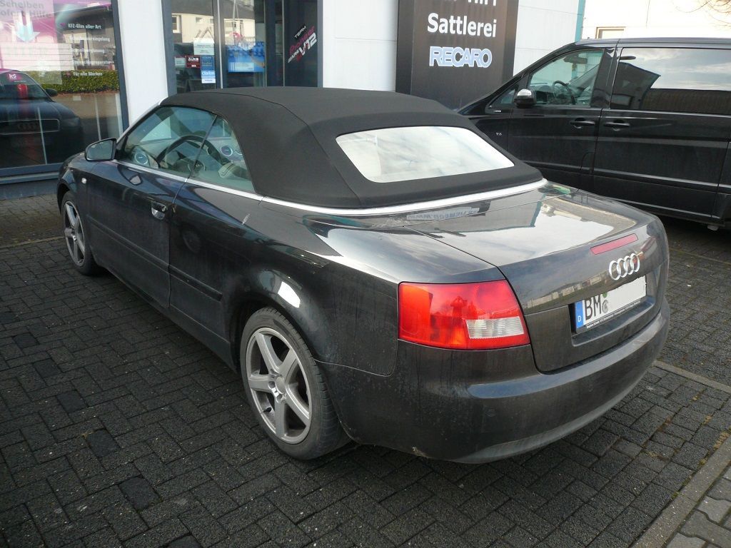 Audi A4, Verdeckbezug Sonnenland Stoff schwarz geliefert und montiert.
