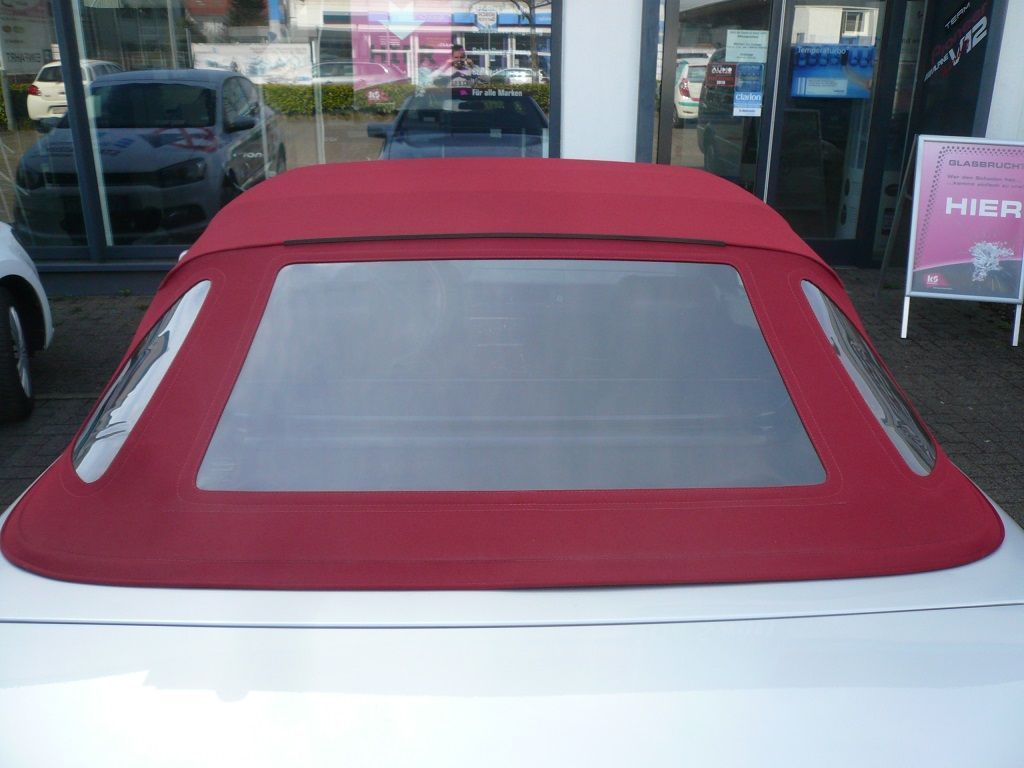 Mercedes SL 129er, Verdeckbezug in Sonnenland Stoff schwarz geliefert und montiert.