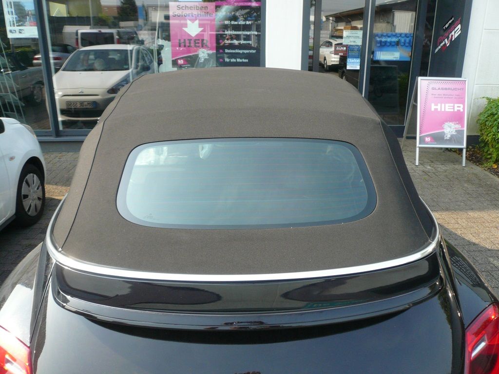 VW Beetle, Verdeckbezug in Sonnenland Stoff schwarz geliefert und montiert.
