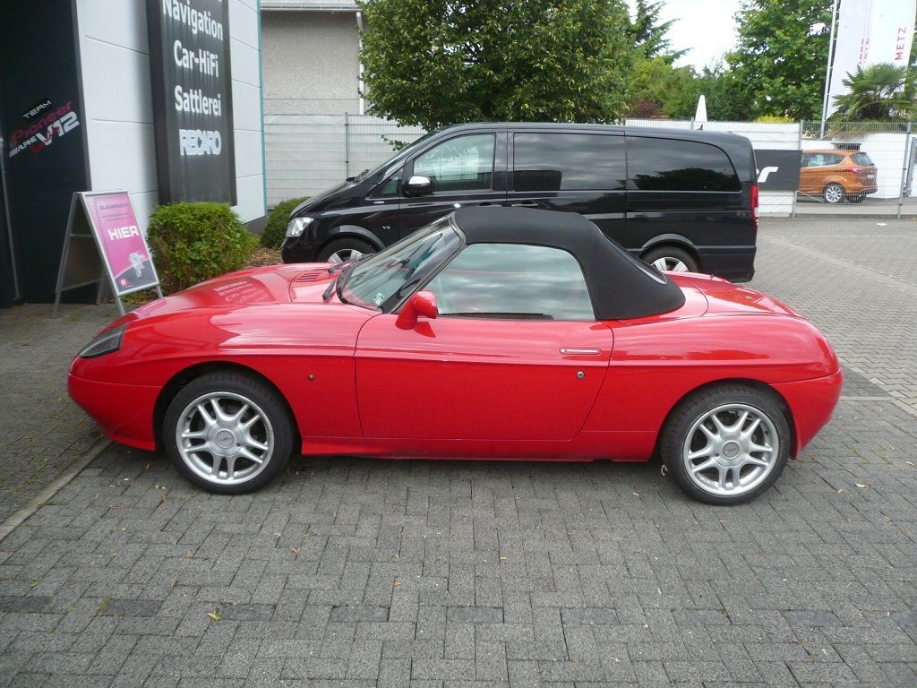 Fiat Barchetta , Verdeckbezug Sonnenland Stoff schwarz geliefert und montiert.