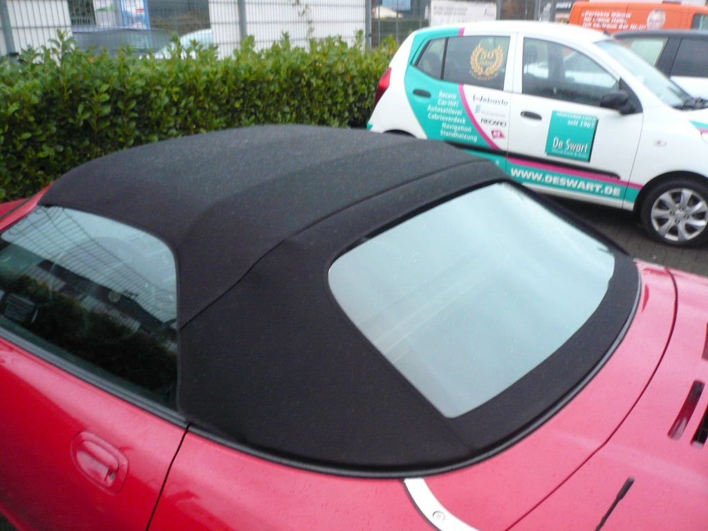 MG-F, Verdeckbezug in Sonnenland Stoff schwarz geliefert und montiert.