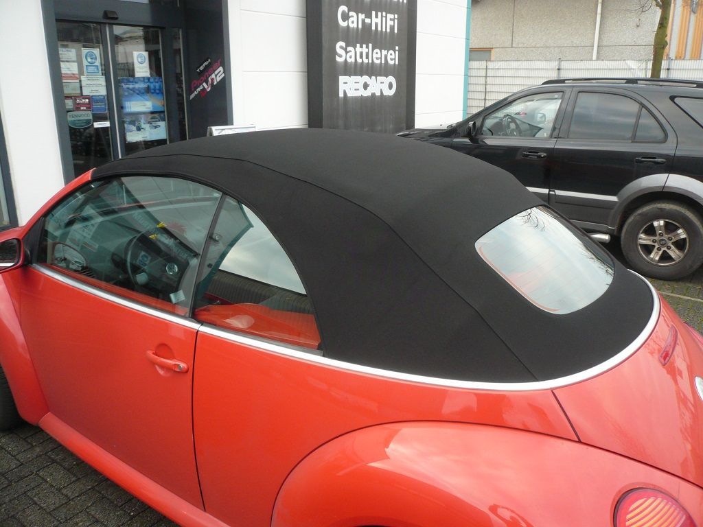 VW Beetle, Verdeckbezug in Sonnenland Stoff schwarz geliefert und montiert.