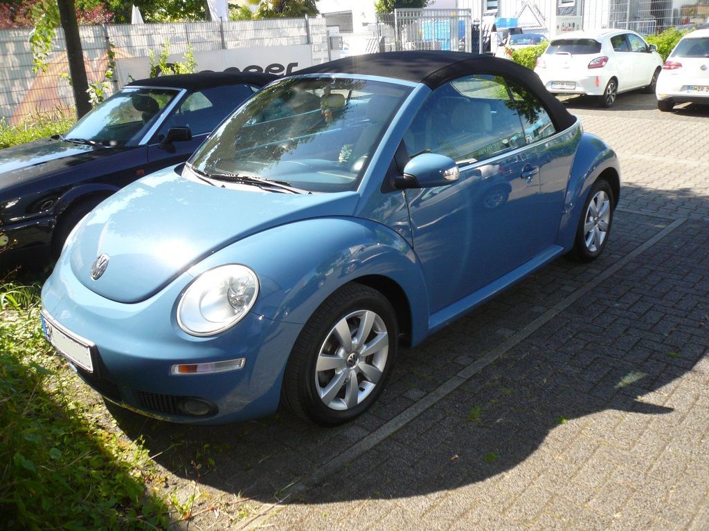 VW Beetle, Verdeckbezug in Sonnenland Stoff schwarz geliefert und montiert.