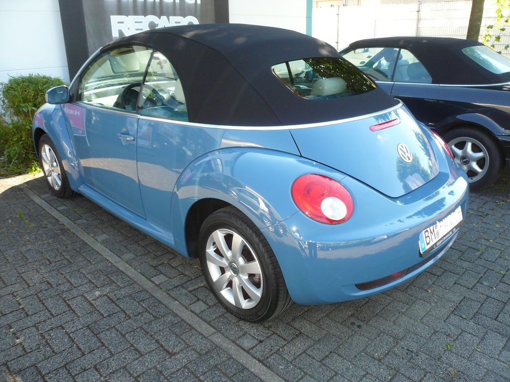 VW Beetle, Verdeckbezug in Sonnenland Stoff schwarz geliefert und montiert.