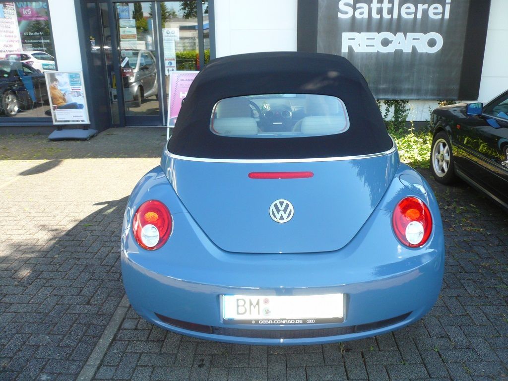 VW Beetle, Verdeckbezug in Sonnenland Stoff schwarz geliefert und montiert.