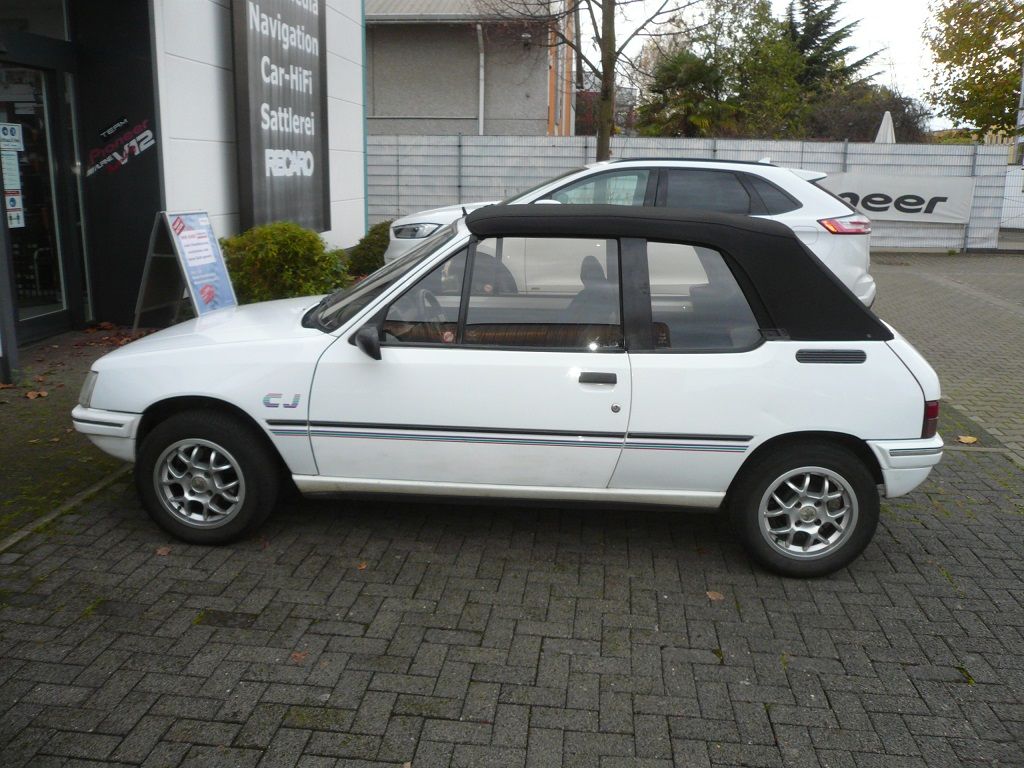 Verdeck Bezug in Sonnenland Stoff schwarz für Peugeot 205 geliefert und montiert