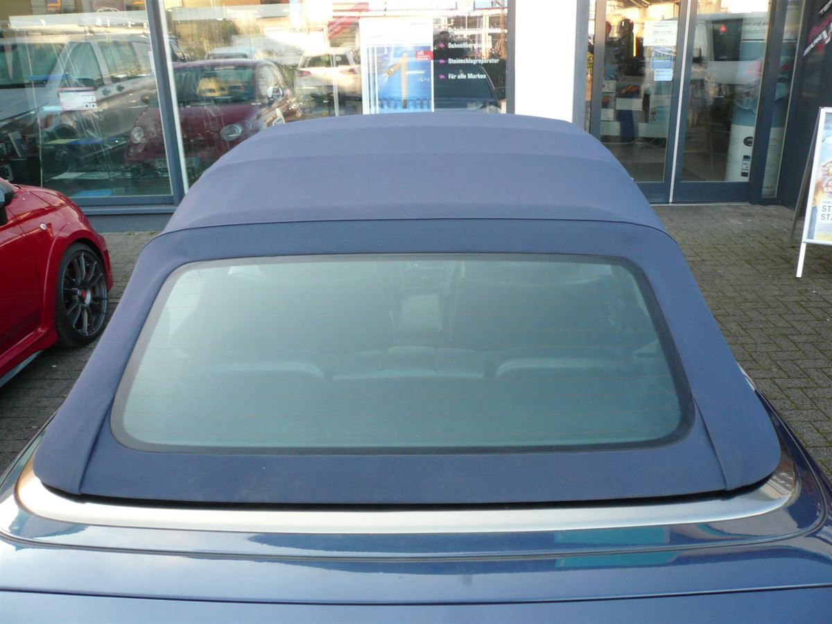 Mercedes E-Klasse Typ W124, Verdeckbezug in Sonnenland Stoff blau mit Glas Heckscheibe geliefert und montiert.