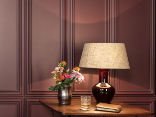 Panneau mural décoratif éclairé par une lampe