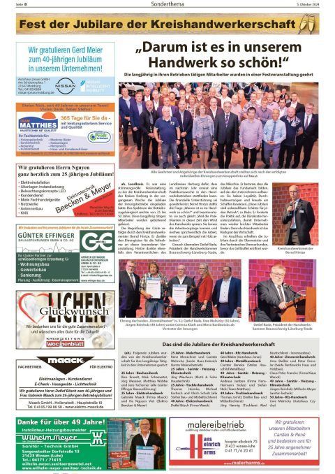 Eine Zeitungsseite mit einer Gruppe von Menschen darauf