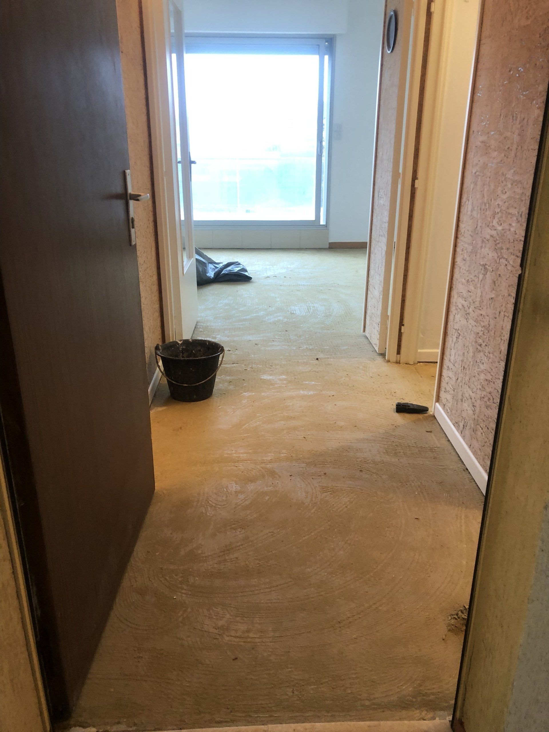 réagréage avant la pose d'un sol