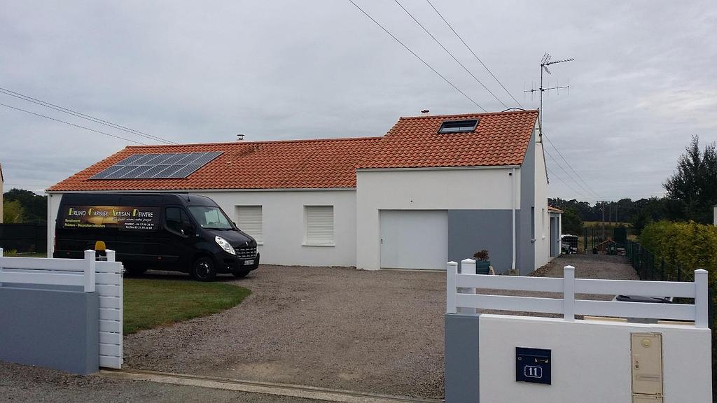 Rénovation de façade beige et gris